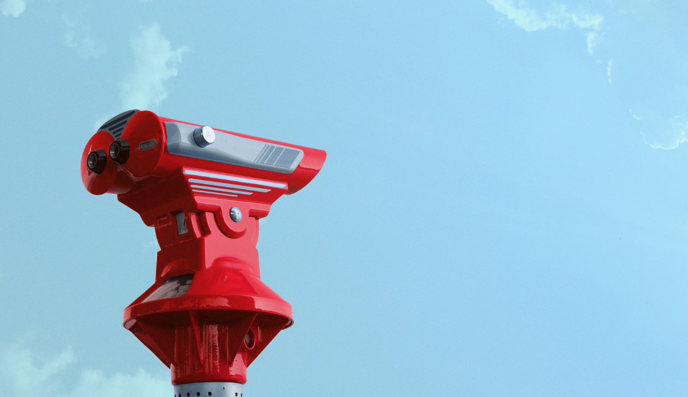 Red Theodolite Under Blue Sky and White Clouds
