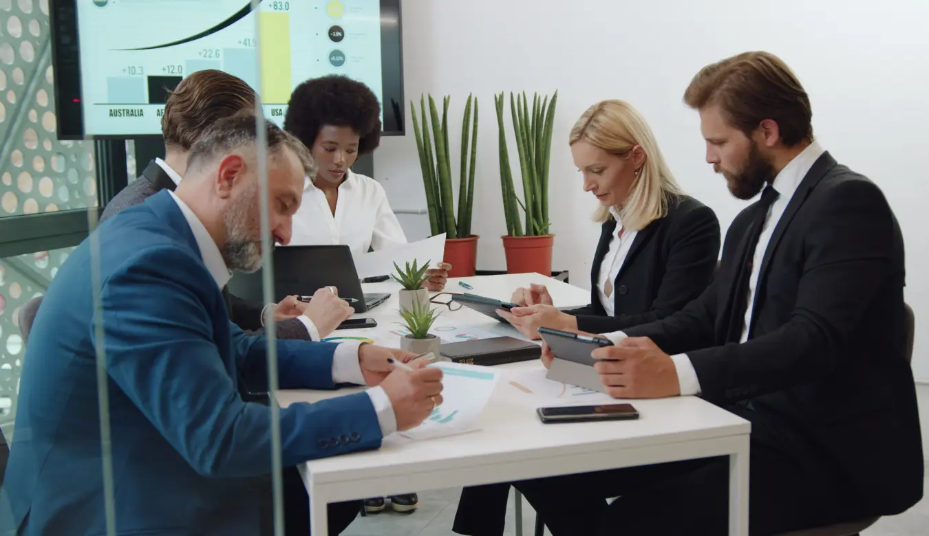 Outsourced procurement consultant working with procurement team